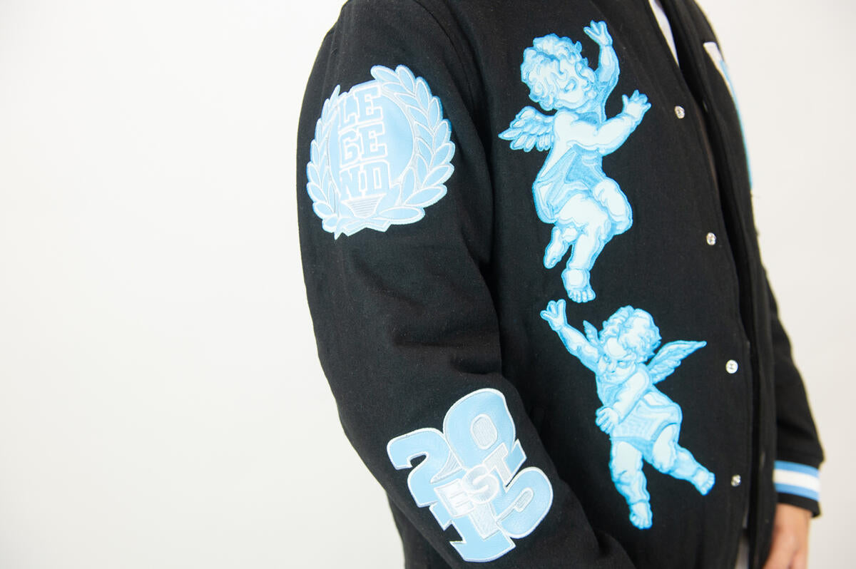 REBEL MINDS WORLD CHAMP VARSITY JACKET