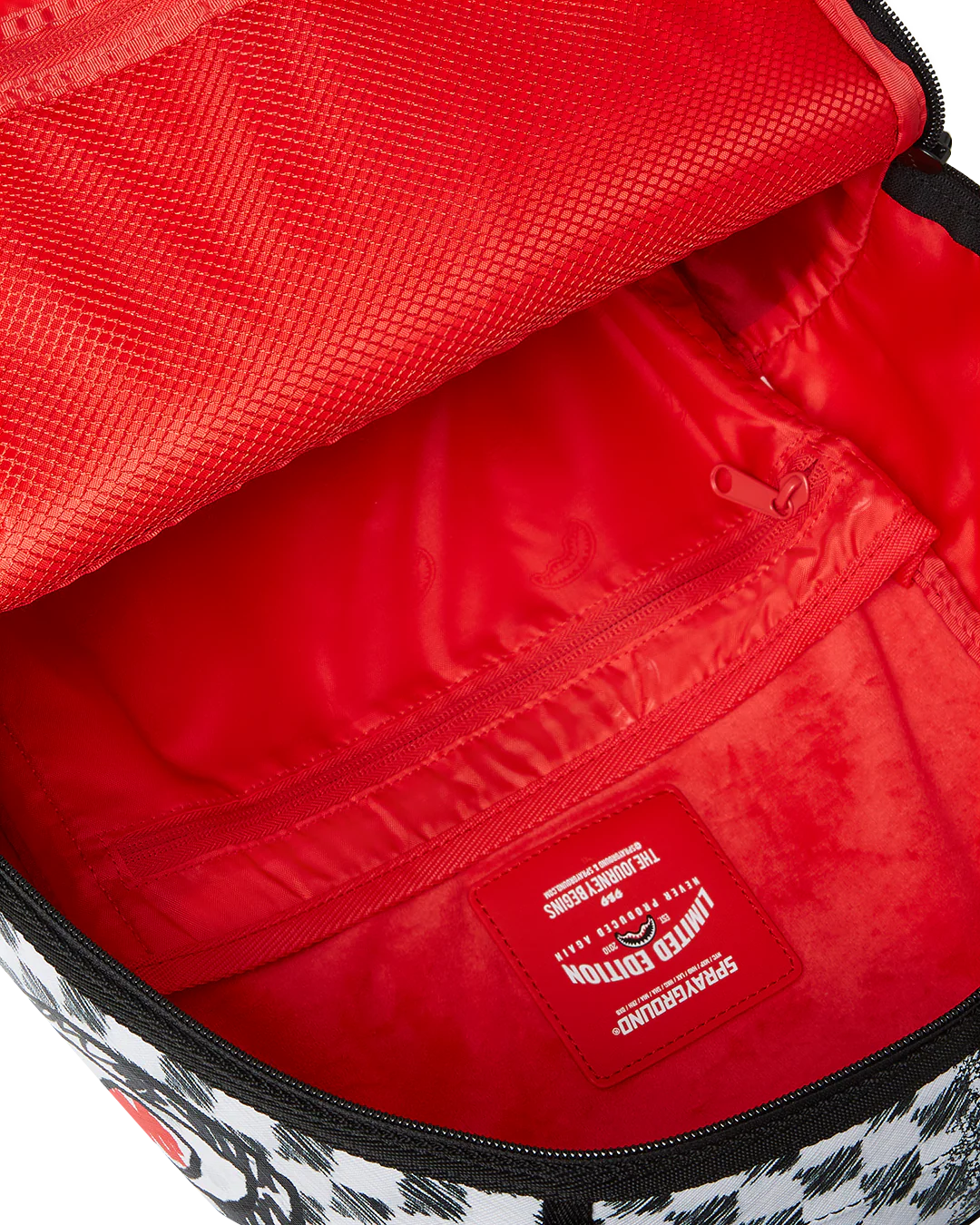SPRAYGROUND SCRIBBLE DRIBBLE CHECK BACKPACK